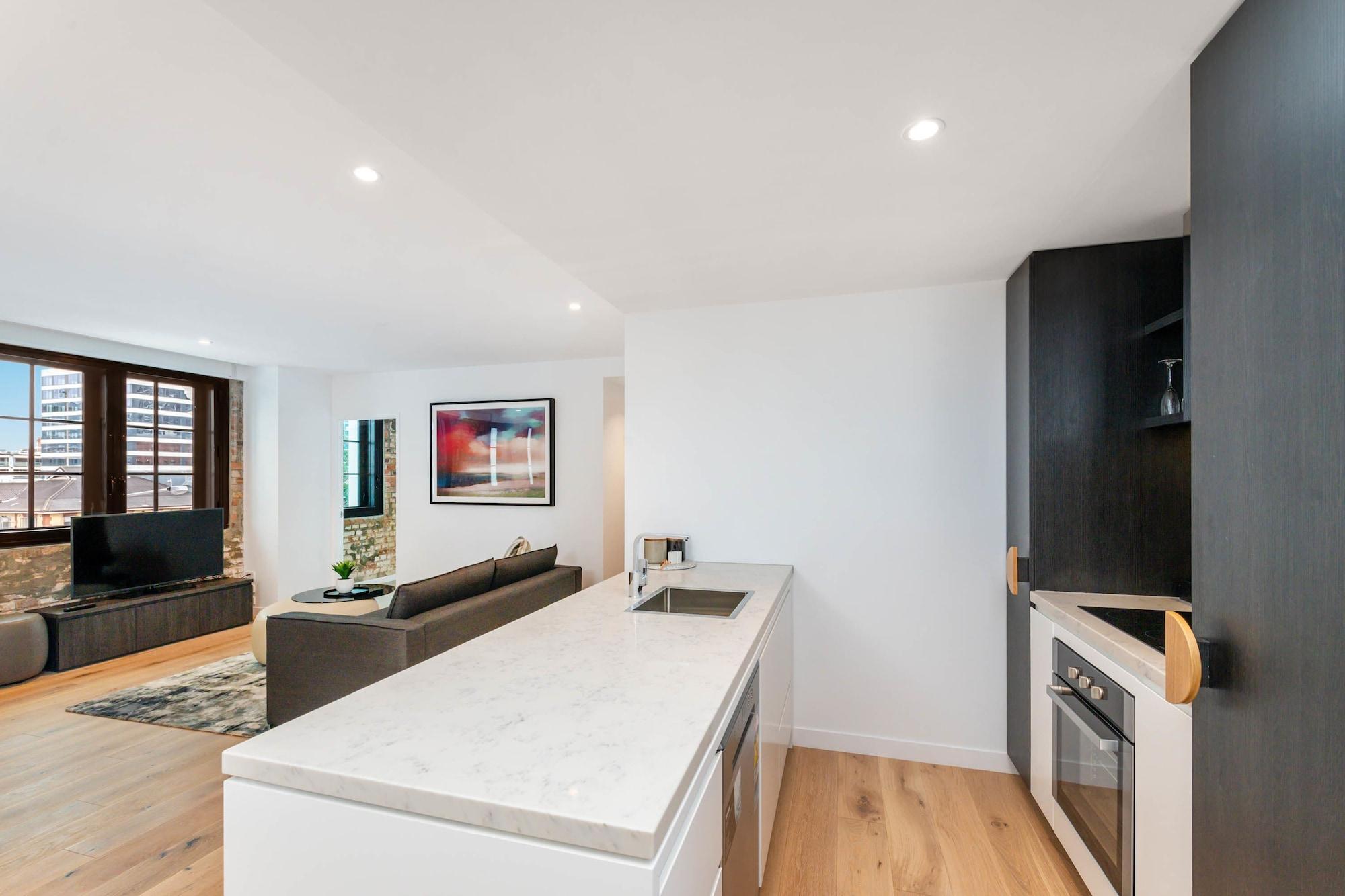 Fv By Peppers Aparthotel Brisbane Ngoại thất bức ảnh The kitchen and living area of a typical apartment